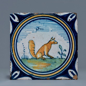 A polychrome Dutch maiolica 'fox' tile, late 16th C.